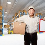 smiling worker in warehouse